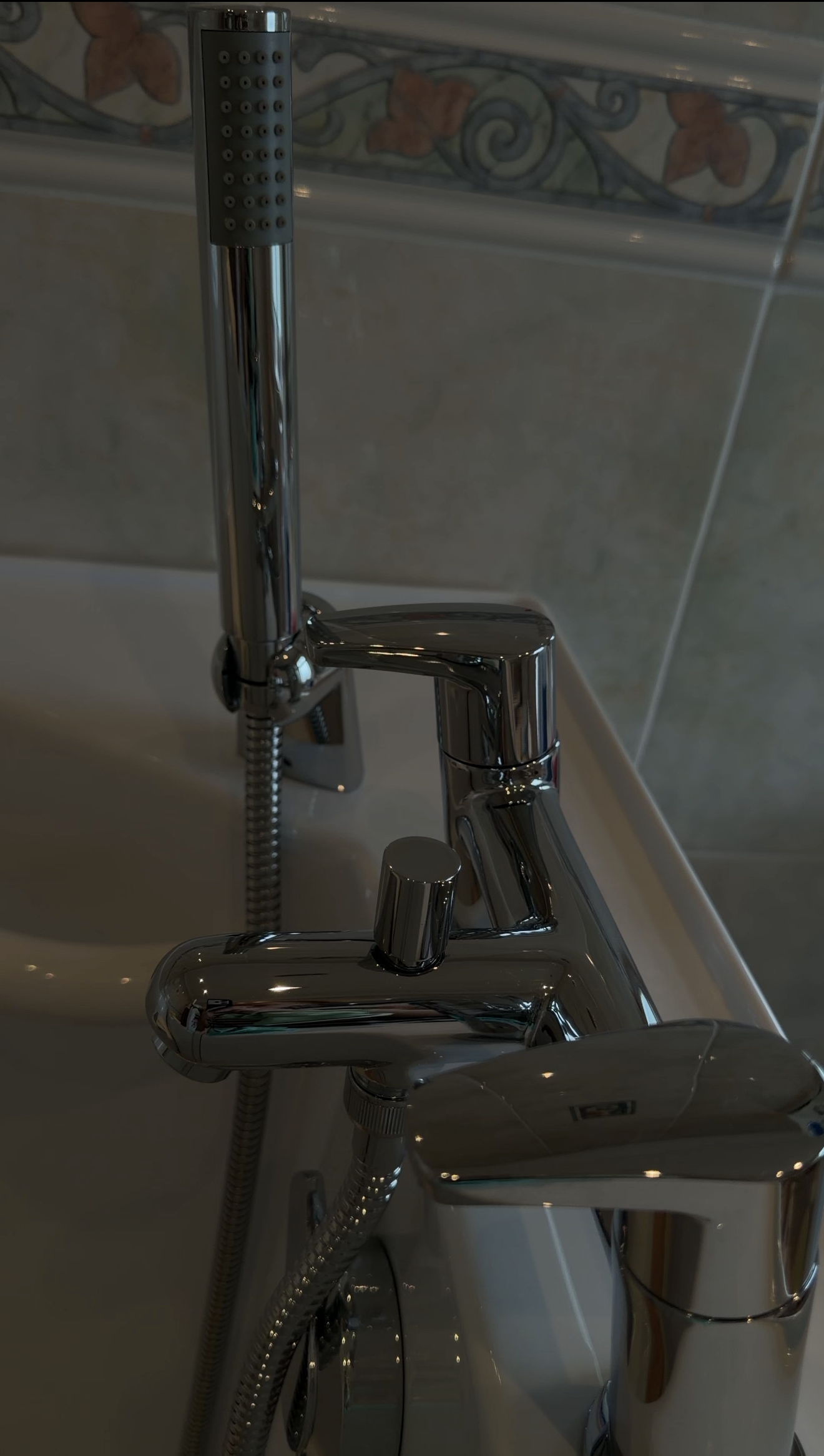 Detail of a spotless tap and sink after professional cleaning